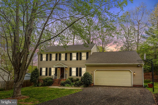 11509 Bend Bow Dr, Fredericksburg, VA 22407 - colonial home with asphalt driveway and an attached garage
