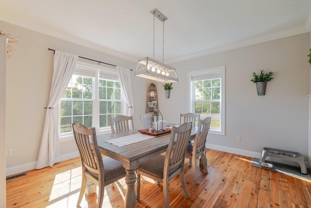 731 Hidden Brook Rd, Mcgaheysville, VA 22840 - dining area with ornamental molding and light wood-type flooring