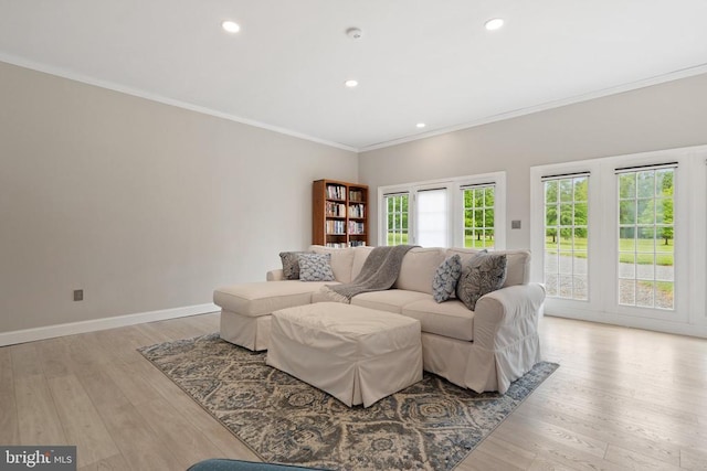  - living area with crown molding, light wood finished floors, and recessed lighting