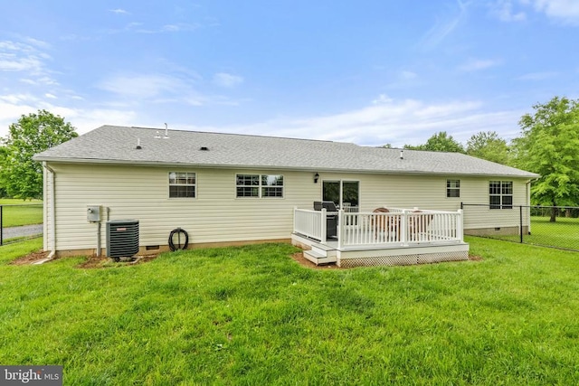  - back of property with crawl space and a deck