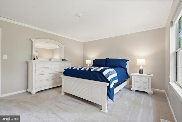  - bedroom with light carpet and ornamental molding