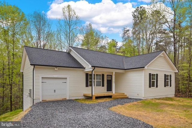358 Hemlock Ln, Mineral, VA 23117 - ranch-style house with a garage, a shingled roof, covered porch, and driveway