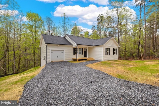 358 Hemlock Ln, Mineral, VA 23117 - ranch-style home featuring a garage, gravel driveway, a shingled roof, and a front lawn