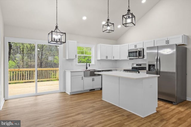 358 Hemlock Ln, Mineral, VA 23117 - kitchen featuring appliances with stainless steel finishes, light countertops, a kitchen island, recessed lighting, and hanging light fixtures