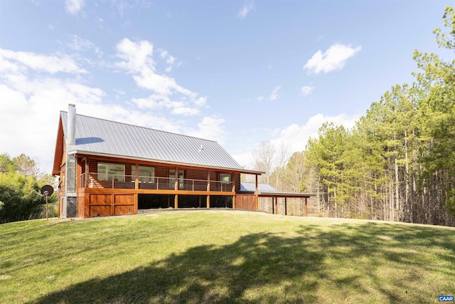 4323 Carter Rd, Schuyler, VA 22969 - back of property featuring a yard, a chimney, and metal roof