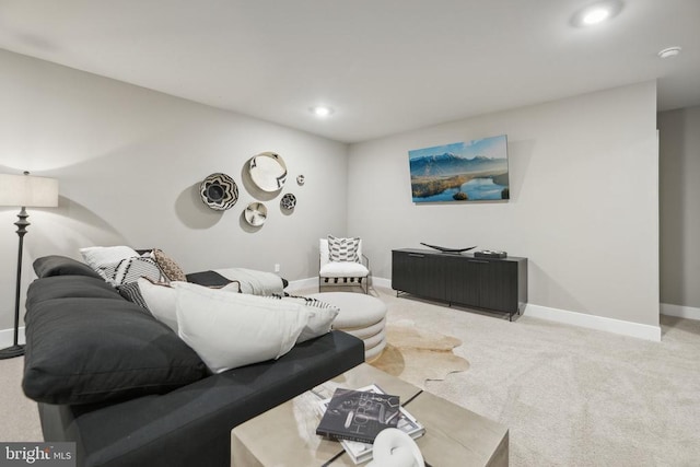  - living area with carpet flooring, baseboards, and recessed lighting