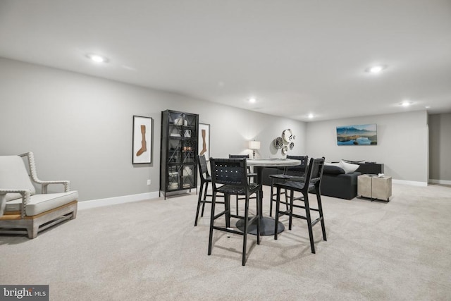  - dining room with recessed lighting, light colored carpet, and baseboards