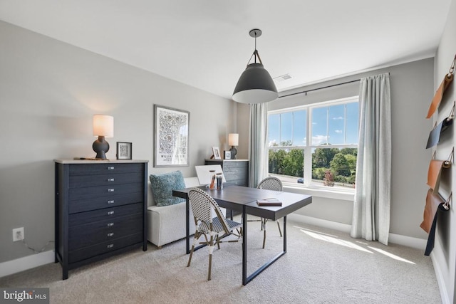  - carpeted office space with baseboards