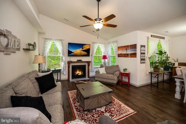 846 Confederate Dr, Locust Grove, VA 22508 - living room with lofted ceiling, wood finished floors, ceiling fan, baseboards, and a fireplace with flush hearth