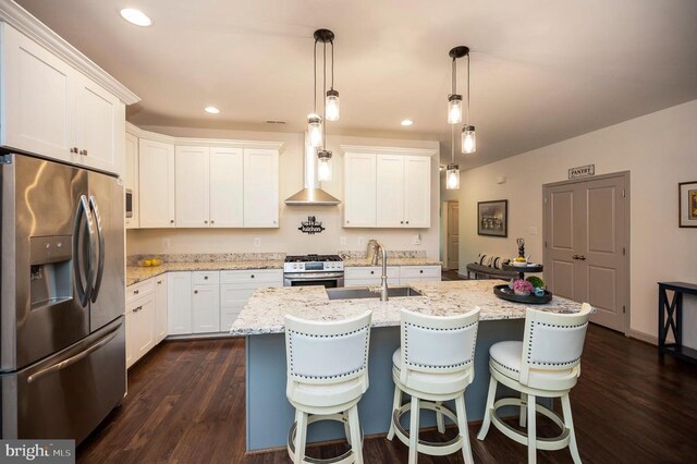 846 Confederate Dr, Locust Grove, VA 22508 - kitchen with a sink, white cabinetry, dark wood-style flooring, appliances with stainless steel finishes, and light stone counters