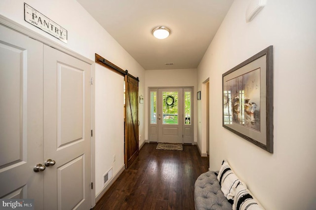846 Confederate Dr, Locust Grove, VA 22508 - corridor with dark wood-style flooring, a barn door, baseboards, and visible vents