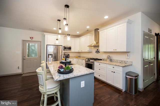 846 Confederate Dr, Locust Grove, VA 22508 - kitchen featuring dark wood-style flooring, wall chimney exhaust hood, white cabinets, and appliances with stainless steel finishes