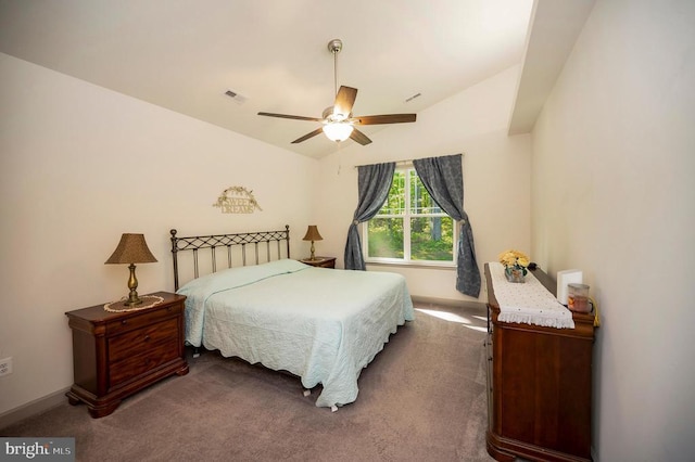 846 Confederate Dr, Locust Grove, VA 22508 - bedroom with dark carpet, ceiling fan, visible vents, and vaulted ceiling