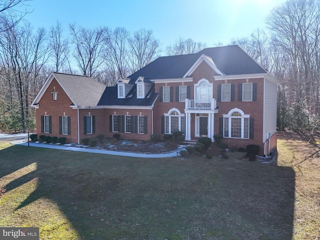 11512 Balmartin Ct, Spotsylvania, VA 22553 - colonial house with a balcony, brick siding, and a front yard