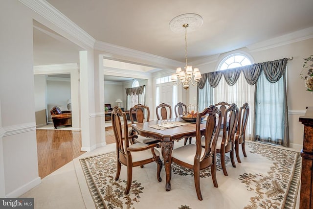 11512 Balmartin Ct, Spotsylvania, VA 22553 - dining space with ornamental molding, a chandelier, and baseboards