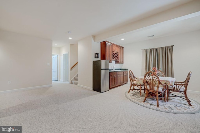 11512 Balmartin Ct, Spotsylvania, VA 22553 - dining space featuring wet bar, recessed lighting, light carpet, baseboards, and stairs