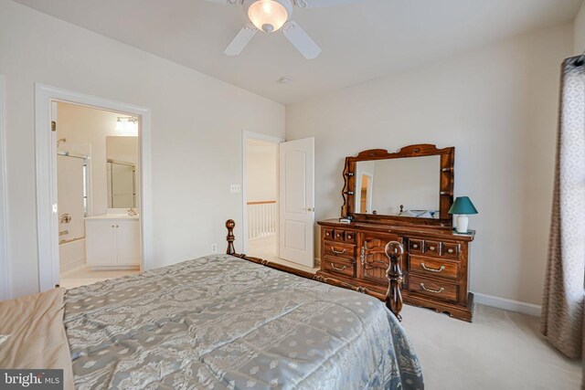 11512 Balmartin Ct, Spotsylvania, VA 22553 - carpeted bedroom featuring baseboards, ceiling fan, and ensuite bath