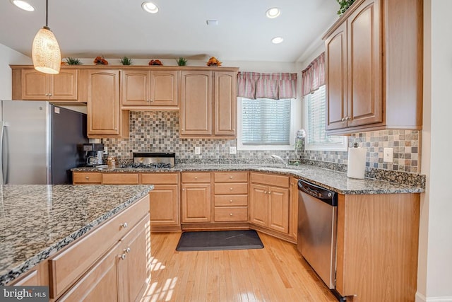 11512 Balmartin Ct, Spotsylvania, VA 22553 - kitchen with stainless steel appliances, light wood-type flooring, a sink, stone counters, and recessed lighting