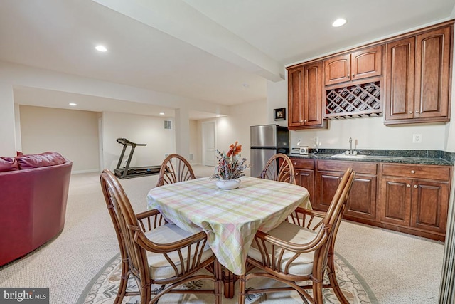 11512 Balmartin Ct, Spotsylvania, VA 22553 - dining room with wet bar, light carpet, and recessed lighting