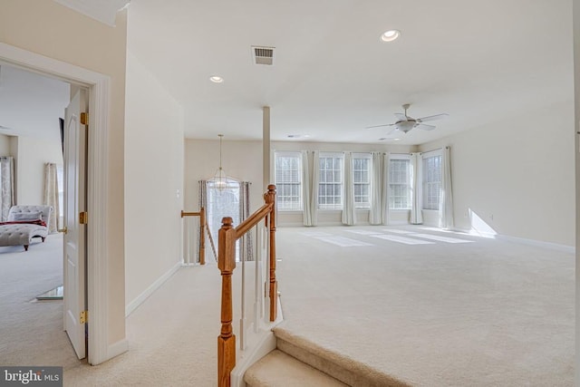 11512 Balmartin Ct, Spotsylvania, VA 22553 - hallway featuring light carpet, baseboards, an upstairs landing, recessed lighting, and a chandelier
