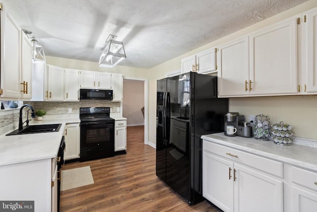 9128 Woodbrook Ln, Culpeper, VA 22701 - kitchen featuring black appliances, a sink, white cabinetry, tasteful backsplash, and a textured ceiling