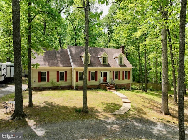 9128 Woodbrook Ln, Culpeper, VA 22701 - cape cod-style house featuring a chimney and a front yard