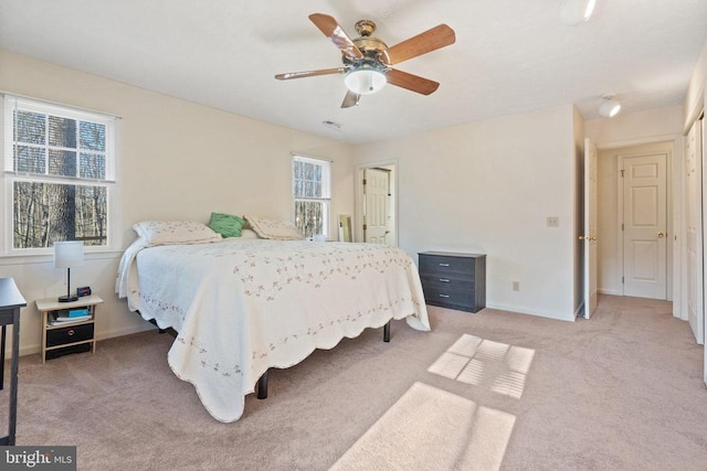 9128 Woodbrook Ln, Culpeper, VA 22701 - bedroom with light carpet, baseboards, and ceiling fan