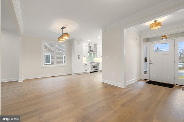57 Madison St, Warrenton, VA 20186 - entryway with light wood-style flooring, crown molding, baseboards, and recessed lighting