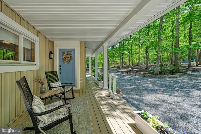 deck with covered porch