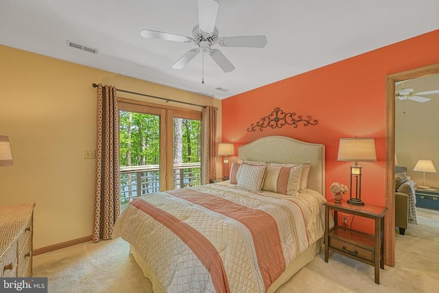 bedroom with light carpet, a ceiling fan, and baseboards