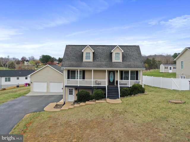 317 Locustdale Loop, Shenandoah, VA 22849 - cape cod home with covered porch, a detached garage, and roof with shingles