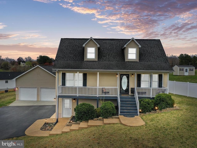 317 Locustdale Loop, Shenandoah, VA 22849 - cape cod house featuring covered porch, stairs, roof with shingles, and a detached garage