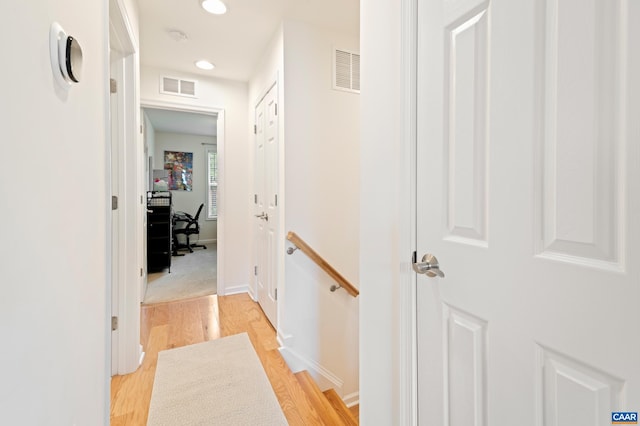 139 Longwood Dr, Charlottesville, VA 22903 - hallway featuring light wood finished floors, an upstairs landing, recessed lighting, and baseboards