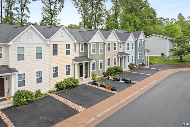 139 Longwood Dr, Charlottesville, VA 22903 - view of property featuring board and batten siding and roof with shingles