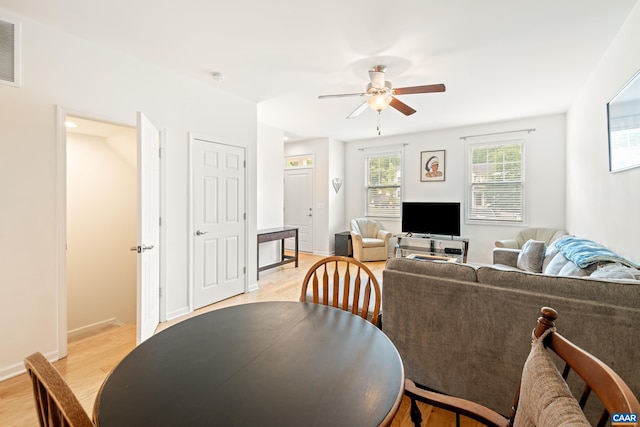 139 Longwood Dr, Charlottesville, VA 22903 - dining room with light wood-type flooring, a ceiling fan, and baseboards