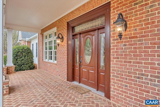 1660 Lees Mill Ln, Goode, VA 24556 - property entrance featuring a porch and brick siding