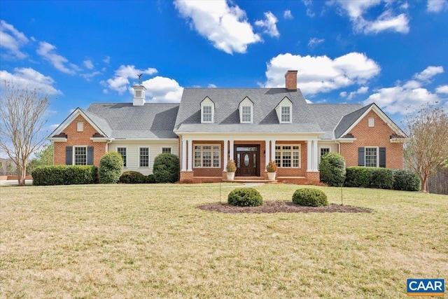 1660 Lees Mill Ln, Goode, VA 24556 - cape cod-style house with brick siding, a chimney, and a front lawn