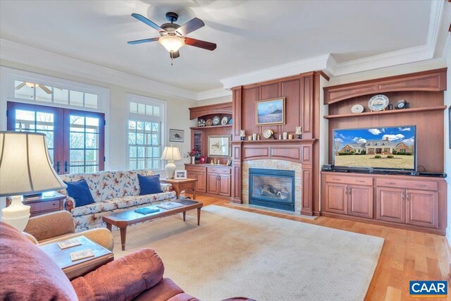 1660 Lees Mill Ln, Goode, VA 24556 - living room featuring a ceiling fan, a high end fireplace, light wood finished floors, and ornamental molding