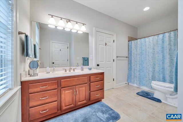 1660 Lees Mill Ln, Goode, VA 24556 - bathroom featuring vanity, toilet, tile patterned flooring, a shower with shower curtain, and baseboards