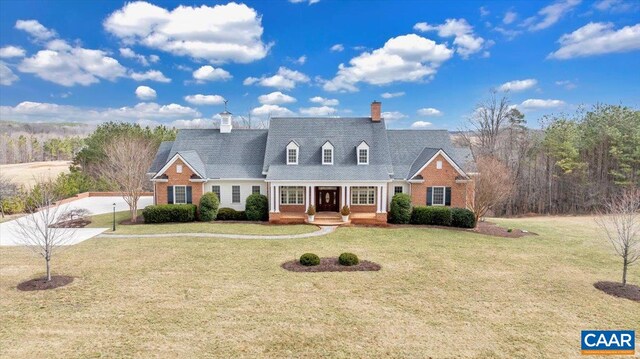 1660 Lees Mill Ln, Goode, VA 24556 - cape cod house with a porch, a chimney, a front lawn, and brick siding