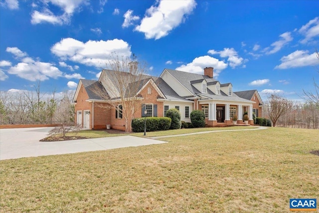 1660 Lees Mill Ln, Goode, VA 24556 - view of front of home with brick siding, a front yard, covered porch, a chimney, and concrete driveway