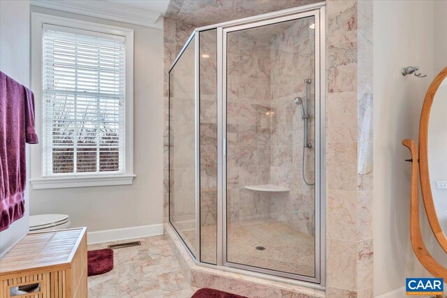 1660 Lees Mill Ln, Goode, VA 24556 - full bath featuring a stall shower, baseboards, marble finish flooring, and crown molding