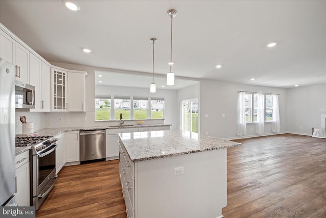 2093 Whithorn Hl, Jeffersonton, VA 22724 - kitchen with stainless steel appliances, dark wood finished floors, a kitchen island, plenty of natural light, and recessed lighting
