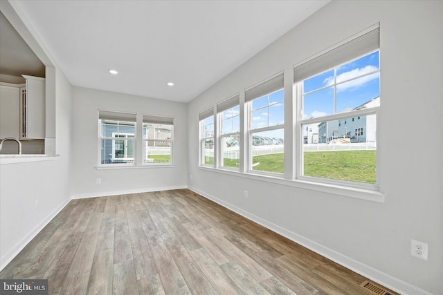 2093 Whithorn Hl, Jeffersonton, VA 22724 - unfurnished room with wood finished floors and recessed lighting