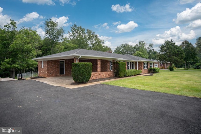 19253 Rolling Hills Dr, Culpeper, VA 22701 - ranch-style house with brick siding, driveway, and a front yard