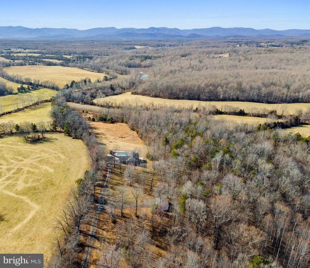 bird's eye view featuring a rural view and a mountain view