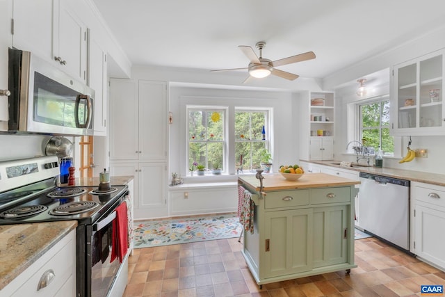 2523 Stony Point Rd, Charlottesville, VA 22911 - kitchen featuring appliances with stainless steel finishes, green cabinets, ceiling fan, white cabinets, and wooden counters