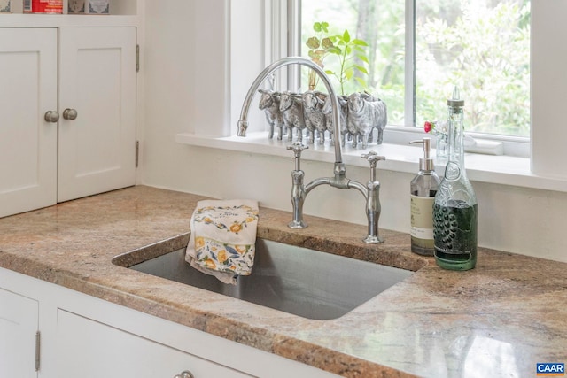 2523 Stony Point Rd, Charlottesville, VA 22911 - kitchen view of a sink and white cabinetry