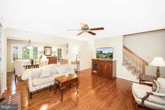 215 Mt Pleasant Dr, Locust Grove, VA 22508 - living area with wood finished floors, a ceiling fan, and stairs