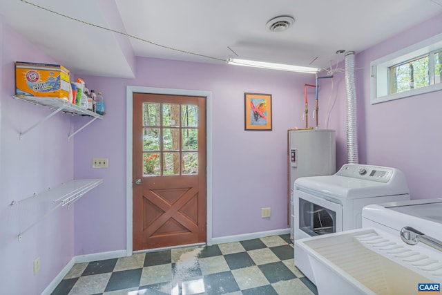 711 Jefferson Dr, Palmyra, VA 22963 - clothes washing area featuring independent washer and dryer, water heater, plenty of natural light, and tile patterned floors